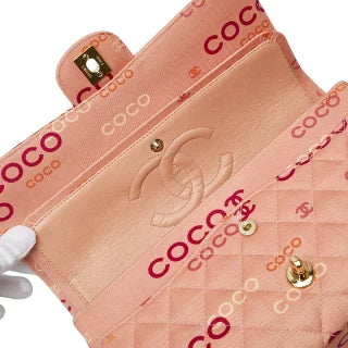 シャネル ココマーク COCOプリント ダブルフラップ チェーン ショルダーバッグ サーモンピンク マルチカラー キャンバス レディース CHANEL 【中古】